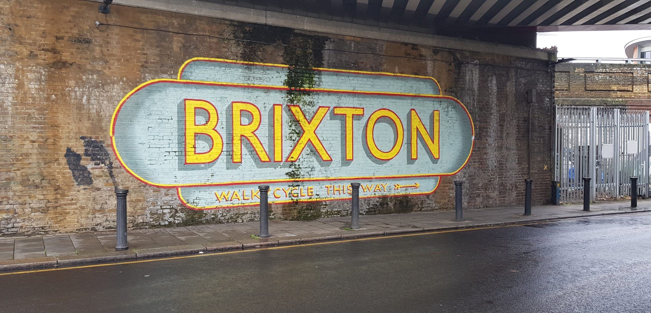 Brixton logo under train tunnel